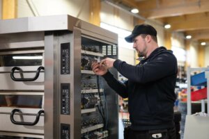 An industrial temporary worker at an installation site.